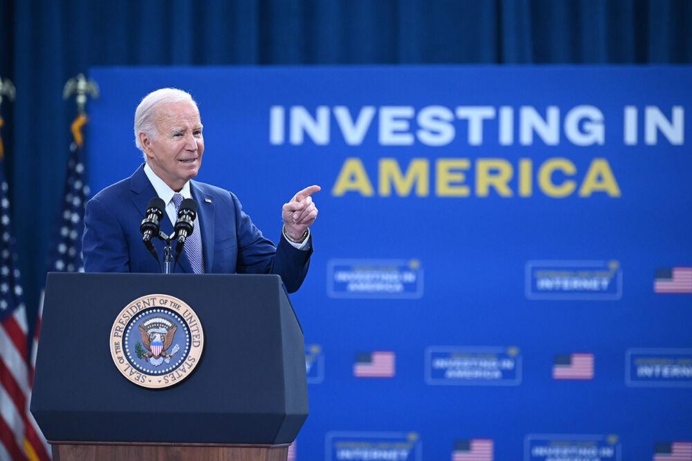 President Joe Biden points toward North Carolina Governor Roy Cooper at the Abbotts Creek Community Center in Raleigh, NC on Thursday, Jan. 18, 2024. President Biden spoke on new investments to connect North Carolina homes to high-speed internet, new, faster rail lines and other developments as a part of the Biden-Harris Administration&#8217;s Investing in America agenda.