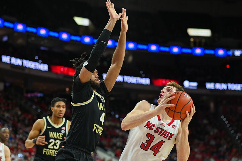 Junior forward Ben Middlebrooks goes up for a contested layup during the game versus the Wake Forest Demon Deacons in PNC Arena on Tuesday, Jan. 16, 2024. Middlebrooks scored 14 points and had six rebounds against Wake Forest. The Wolfpack beat the Demon Deacons 83-76.