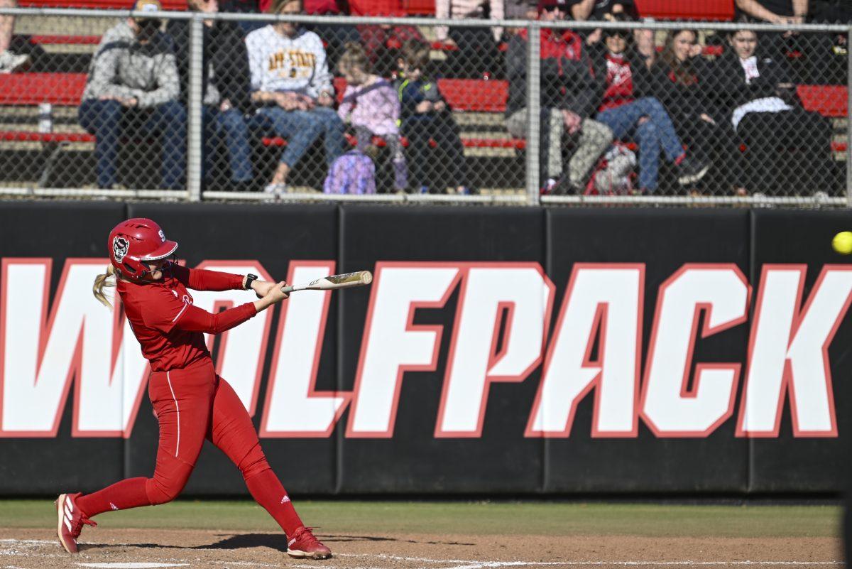 Junior infielder Hannah Goodwin hits the ball during the game against App State at Dail Softball Stadium on Sunday, Feb. 25, 2024. NC State beat App State 6-2.