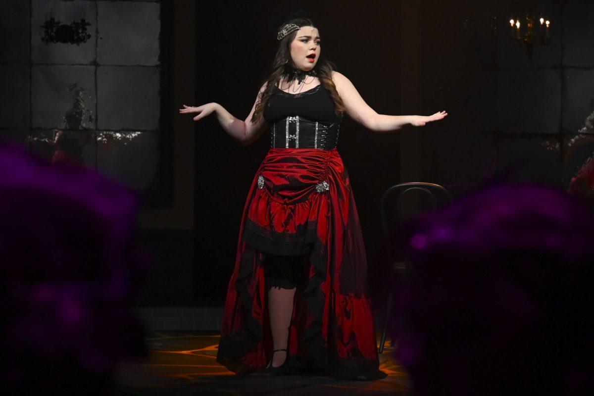 Madeline Core, a second-year studying history, as Lucy Harris sings "Bring On The Men" during the performance of Jekyll and Hyde in Stewart Theatre on Wednesday, Feb. 14, 2024. The musical was based on author Robert Louis Stevenson's novel, The Strange Case of Dr. Jekyll and Mr. Hyde.