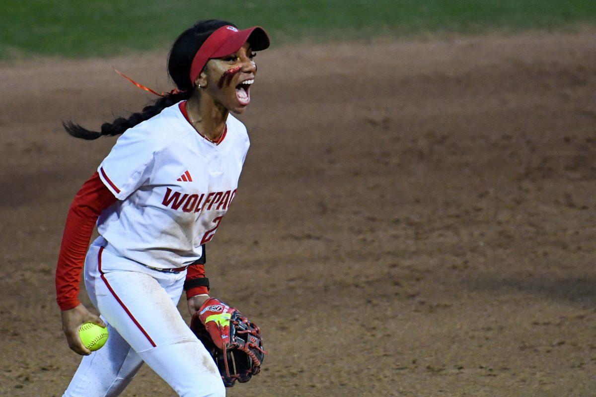 Sophomore utility player MaKayla Marbury cheers in the game against Campbell at Dail Softball Stadium on Friday, Feb. 16, 2024. Marbury had one run and one hit. NC State won the game 4-3.