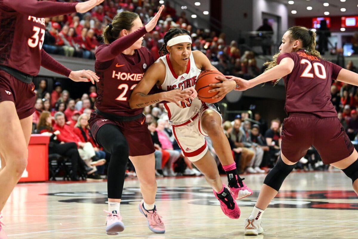 Junior guard Aziaha James drives the ball to the basket during the game against Virginia Tech in Reynolds Coliseum on Thursday, Feb. 8, 2024. James scored 17 points. NC State lost to Virginia Tech 72-61.