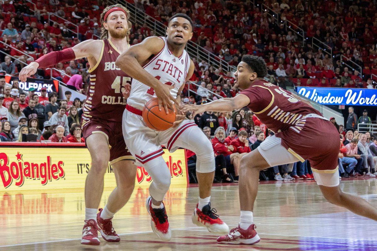 Graduate guard Casey Morsell breaks past his defenders during the game against Boston College in PNC Arena on Saturday, Feb. 24, 2024. Morsell scored 13 points during the game. NC State beat Boston College 81-70