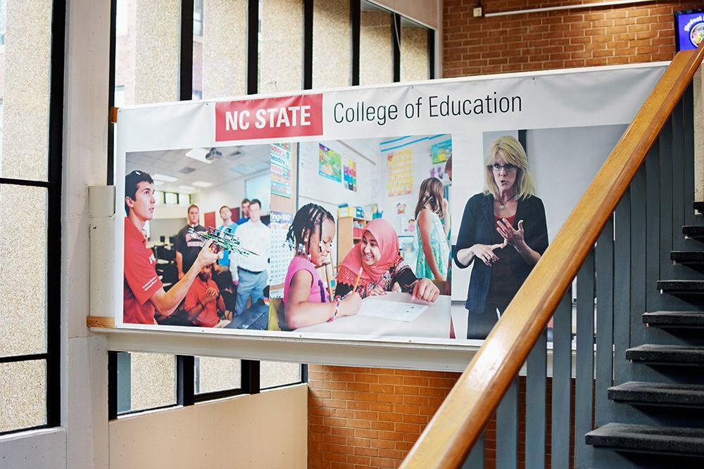 In this archive photo taken on Aug. 30, 2017, a banner advertising the NC State University College of Education hangs in the entrance to Poe Hall. Poe Hall is home to the education school at NC State as well as the psychology department and STEM education.