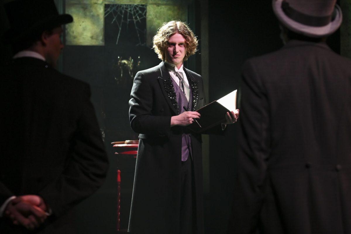 Jake Ensey, a fourth-year studying English and theatre, performs as Simon Stride in the Jekyll and Hyde musical in Stewart Theatre on Wednesday, Feb. 14, 2024. The musical was based on author Robert Louis Stevenson's novel, The Strange Case of Dr. Jekyll and Mr. Hyde.