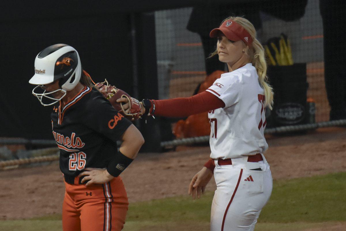 Junior infielder Hannah Goodwin tags an opposing player during the game against Campbell at Dail Softball Stadium on Friday, Feb. 16, 2024. Goodwin had two at bats in the game. NC State beat Campbell 4-3.