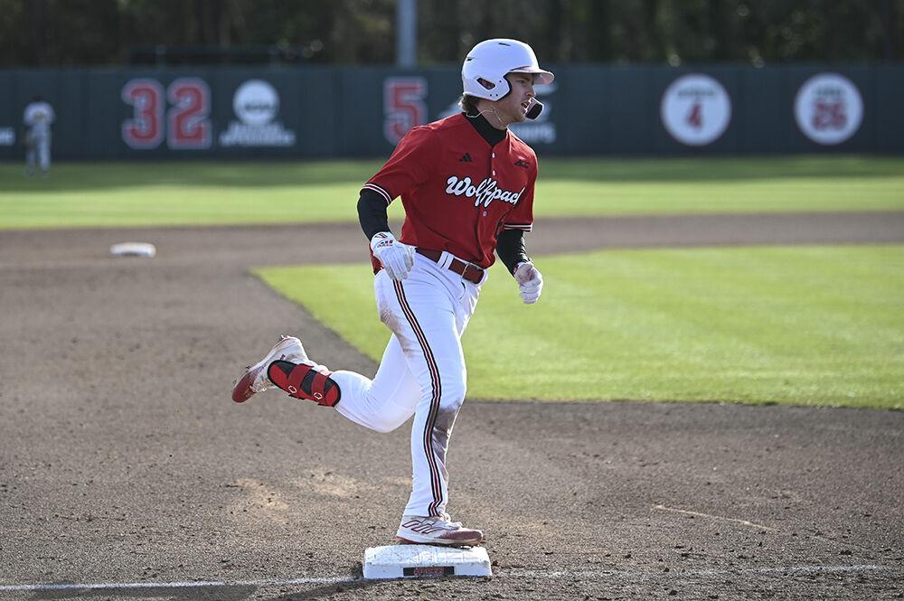 Sophomore infielder Matt Heavner rounds the bases after a solo homerun during the Wolfpack's home game against the VCU Rams on Doak field at Dail Park on Saturday, Feb. 17, 2024. The Wolfpack dropped the second game of the opening series against the rams 9-6.