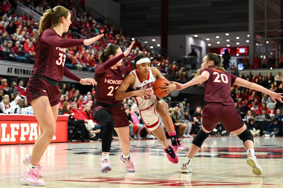 Junior guard Aziaha James drives the ball to the basket during the game against Virginia Tech in Reynolds Coliseum on Thursday, Feb. 8, 2024. James scored 17 points. NC State lost to Virginia Tech 72-61.