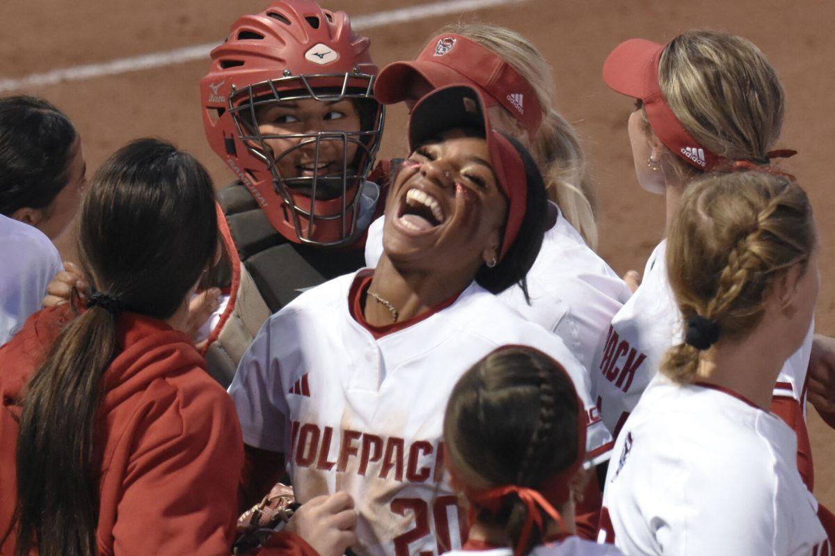 Sophomore utility player MaKayla Marbury celebrates with her team during the game against Campbell at Dail Softball Stadium on Friday, Feb. 16, 2024. Marbury had three at bats, one run and one hit. NC State beat Campbell 4-3.