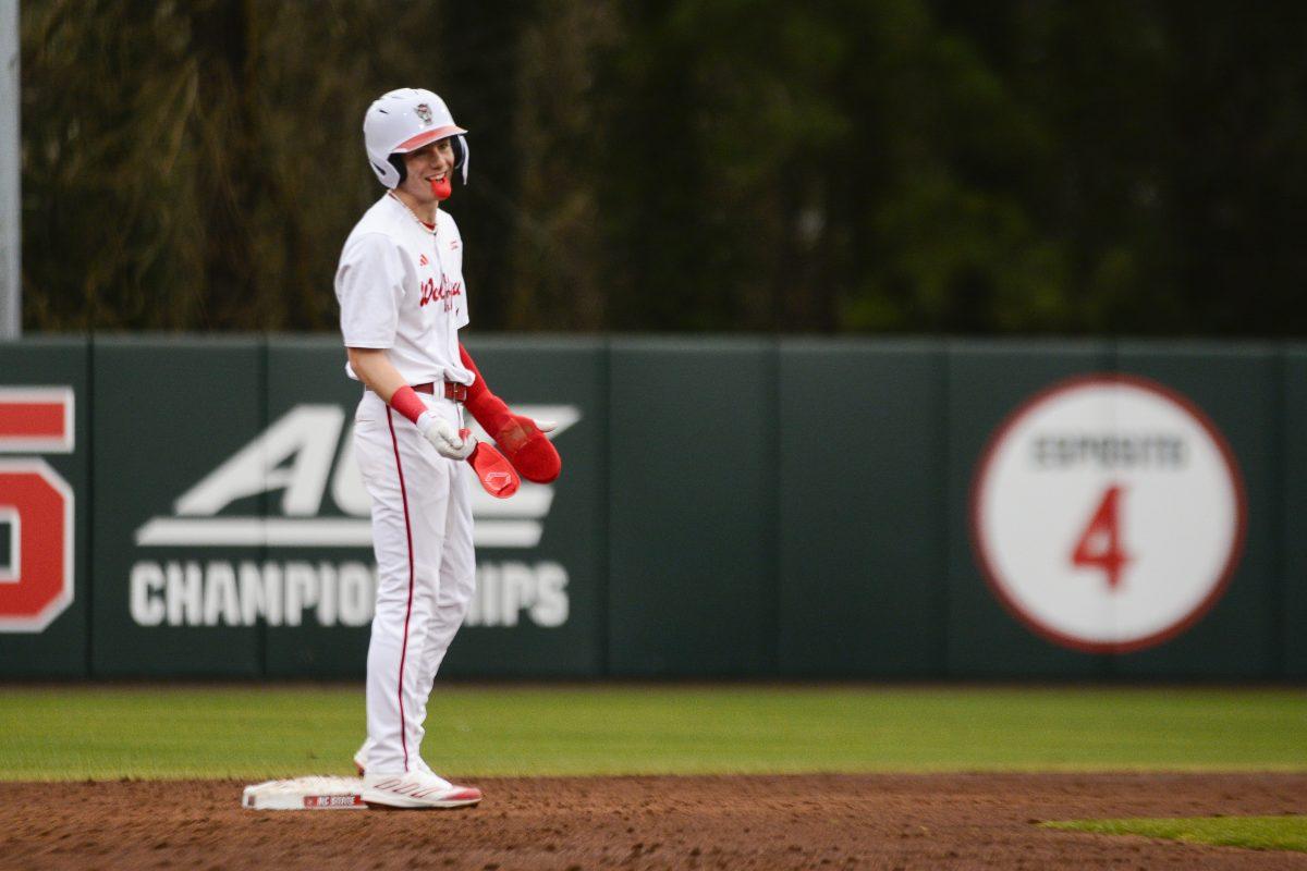 Junior infielder Brandon Butterworth smiles at his teammates after a hit during the opening day baseball game against VCU at Doak Field at Dail Park on Friday, Feb. 16, 2024. Butterworth had two hits and one run. NC State beat VCU 6-1.
