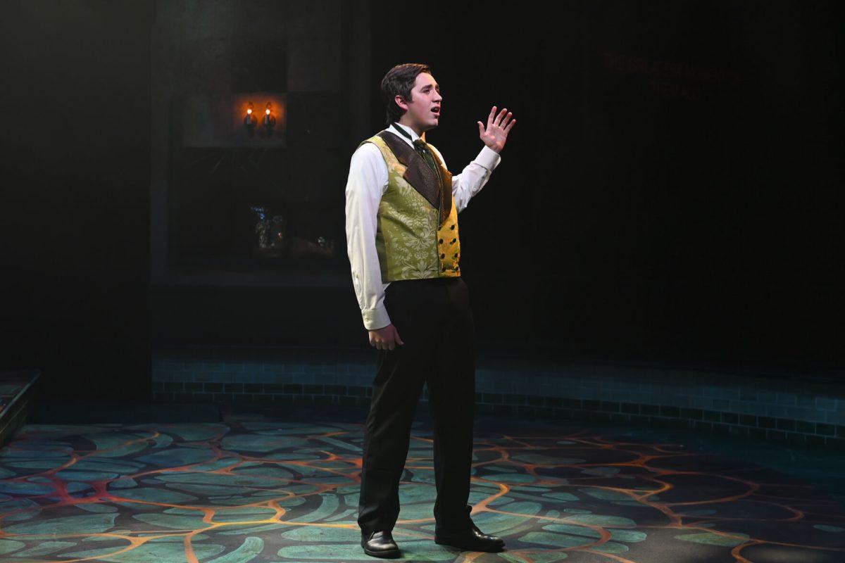 Jackson Lods, a fourth-year studying chemical engineering and mathematics, as Dr. Henry Jekyll and Edward Hyde sings to the audience in the performance of Jekyll and Hyde in Stewart Theatre on Wednesday, Feb. 14, 2024. The musical was based on author Robert Louis Stevenson's novel, The Strange Case of Dr. Jekyll and Mr. Hyde.