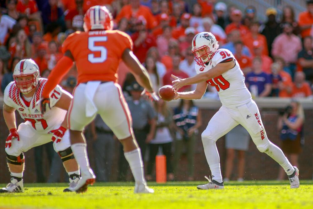 In this archive photo taken on Oct. 20, 2018, punter A.J. Cole III prepares to punt during the game against Clemson at Clemson Memorial Stadium. Cole had six punts for 290 yards. The Wolfpack lost to the Tigers 41-7.