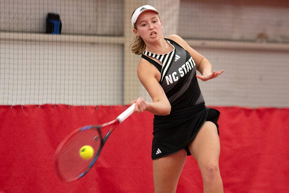 Senior Gina Dittmann forehands the ball during the match against Clemson at J.W. Isenhour Tennis Center on Sunday, Jan. 28, 2024. Dittmann's match went unfinished. NC State beat Clemson 4-0.