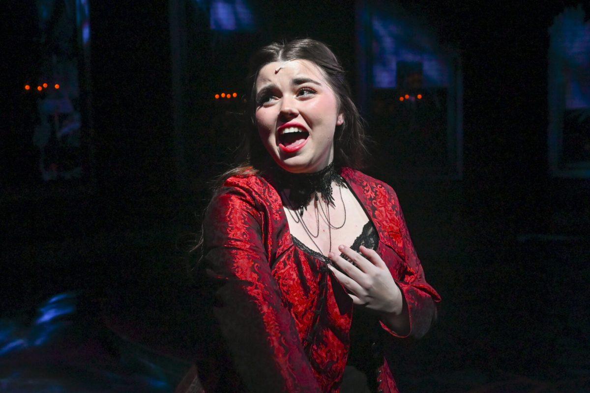 Madeline Core, a second-year studying history, performs as Lucy Harris in the "Jekyll &amp; Hyde" musical in Stewart Theatre on Wednesday, Feb. 14, 2024. The musical was based on author Robert Louis Stevenson's novel, "The Strange Case of Dr. Jekyll and Mr. Hyde."