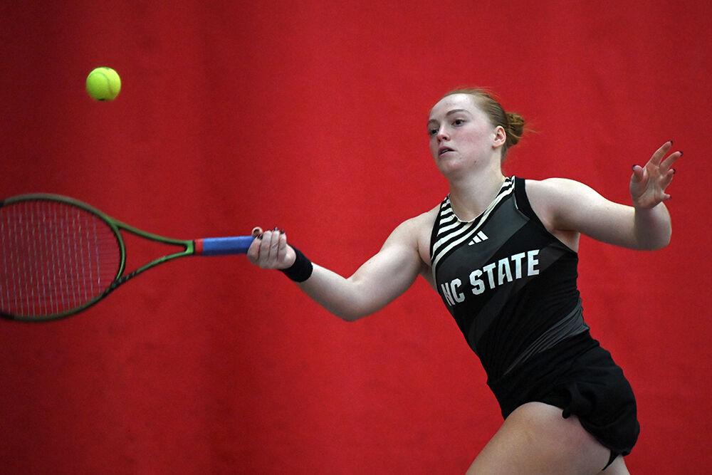 Senior Sophie Abrams runs for the ball during the match against Clemson at J.W. Isenhour Tennis Center on Sunday, Jan. 28, 2024. Abrams won both her singles and doubles matches. NC State beat Clemson 4-0.