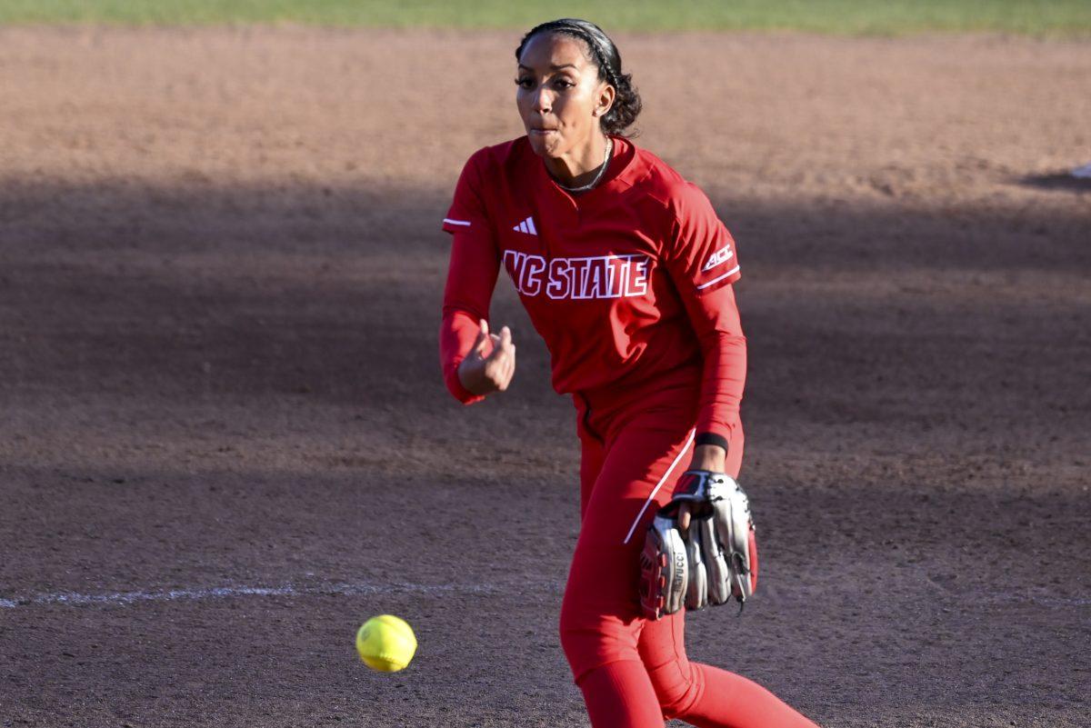 Redshirt senior Aisha Weixelmann throws the ball during the game against App State at Dail Softball Stadium on Sunday, Feb. 25, 2024. Weixlmann pitched for 2.1 innings and struck out 4 players. NC State beat App State 6-2.
