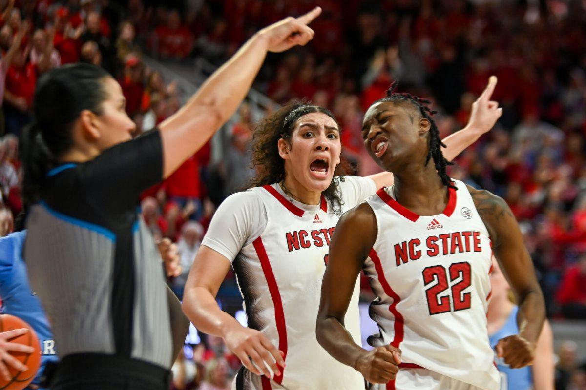 Graduate forward Mimi Collins (left) and junior guard Saniya Rivers (right) express frustration with a play during the game against UNC-Chapel Hill in Reynolds Coliseum on Thursday, Feb. 1, 2024. Collins and Rivers led the Wolfpack in scoring, with a combined total of 28 points. The Wolfpack beat the Tar Heels 63-59.
