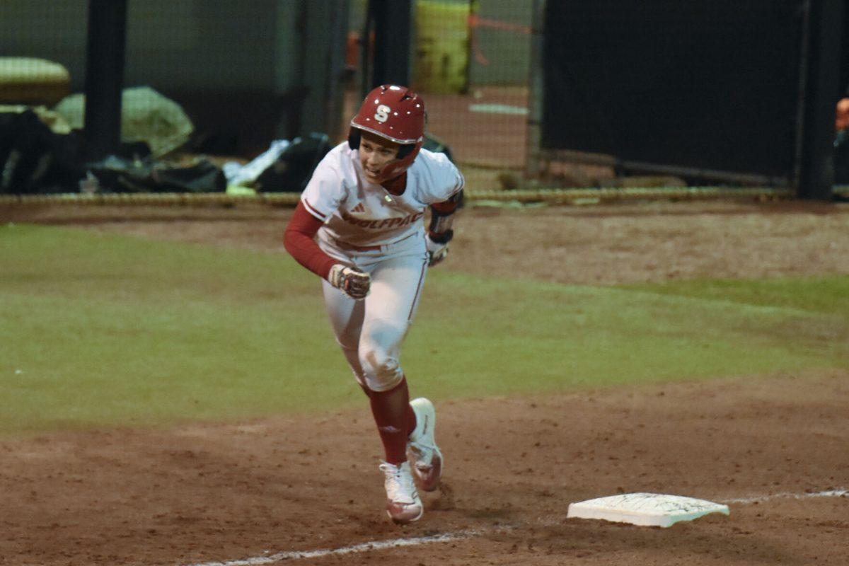 Freshman left fielder Tori Ensley races to home base during the game against Campbell at Dail Softball Stadium on Friday, Feb. 16, 2024. Ensley had two at bats, one run, and one hit. NC State beat Campbell 4-3.