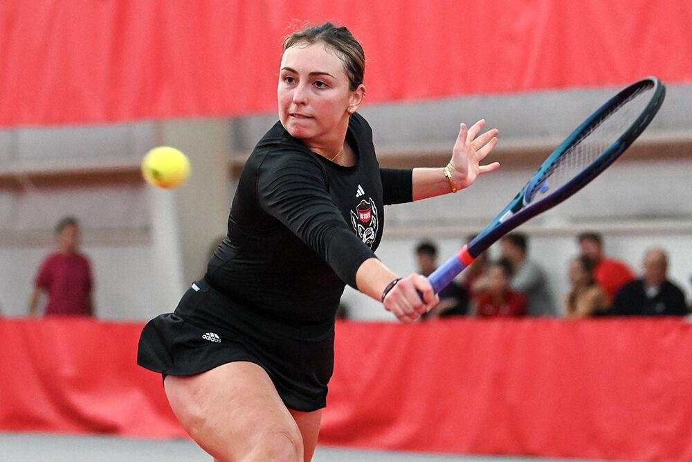 Senior Abigail Rencheli backhands the ball during the match against Alabama at J.W. Isenhour Tennis Center on Saturday, Jan. 27, 2024. Both Rencheli's doubles and singles matches went unfinished. NC State beat Alabama 4-0.