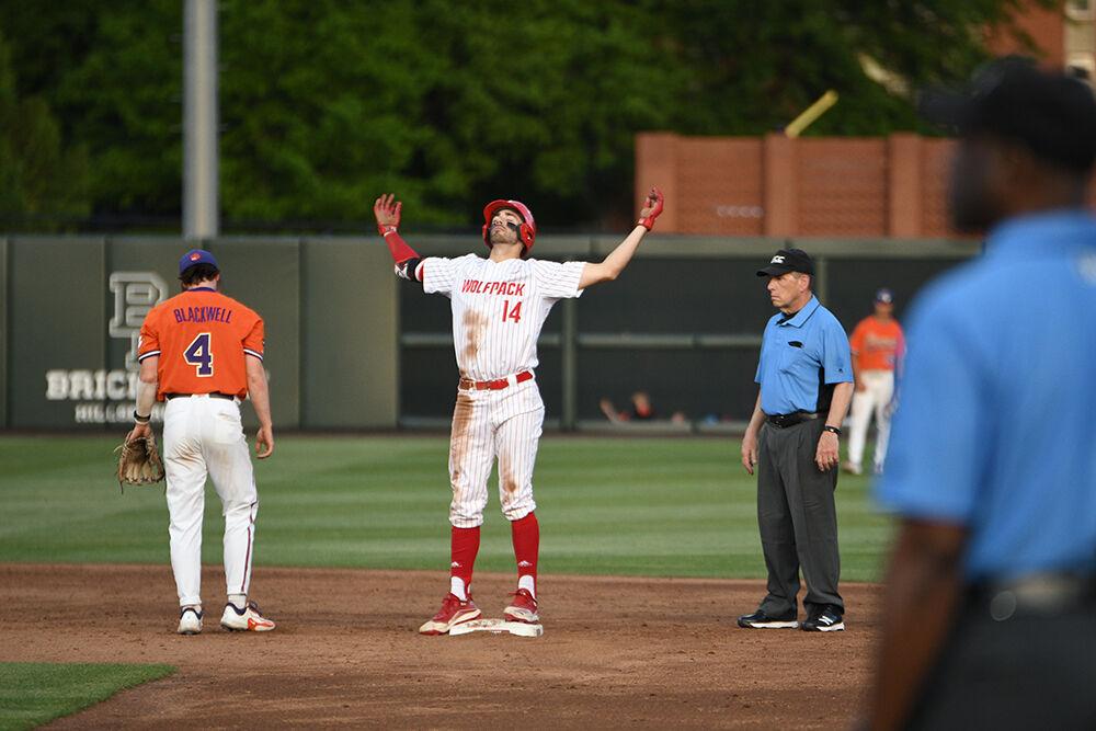 Sophomore catcher Jacob Cozart celebrates a double during the Wolfpack's home game against the Clemson Tigers on Doak Field at Dail Park on Friday, April 21, 2023. The Tigers beat the Wolfpack 10-2.