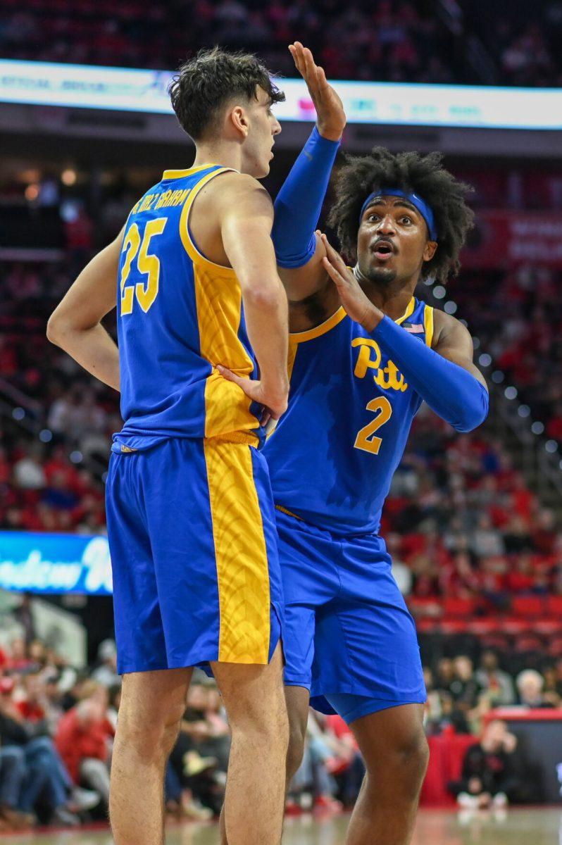Sophomore forward Guillermo Diaz Graham is reprimanded by senior forward Blake Hinson after Graham fouled NC State to send the Wolfpack to the free throw line in PNC Arena on Wednesday, Feb. 7, 2024. Hinson scored 16 points against NC State. The Panthers beat the Wolfpack 67-64.