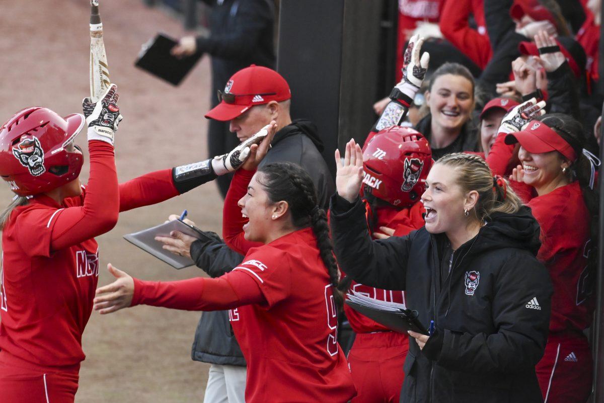 Freshman infielder/outfielder Tori Ensley celebrates scoring a run with the NC State softball team during the game against App State at Dail Softball Stadium on Sunday, Feb. 25, 2024. NC State beat App State 6-2.