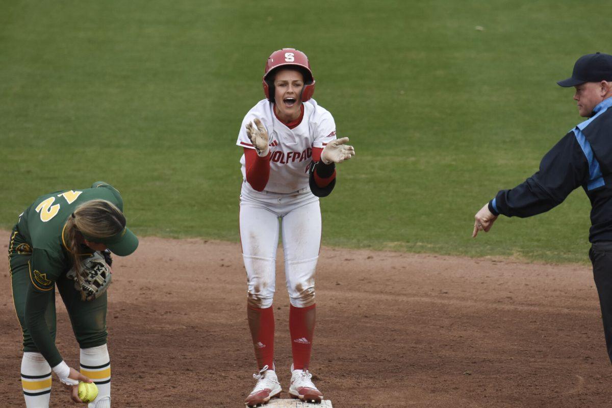 Freshman left fielder Tori Ensley celebrates on second base during the game against North Dakota State at Dail Softball Stadium on Friday, Feb. 16, 2024. Ensley had two hits and three at bats. NC State beat North Dakota State 6-4.
