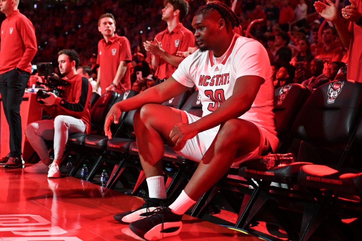 Graduate forward DJ Burns waits for his name to be called before the game versus the Duke Blue Devils in PNC Arena on Monday, March 4, 2024. Burns led the Wolfpack with 27 points against Duke. The Wolfpack lost to the Blue Devils 79-64.