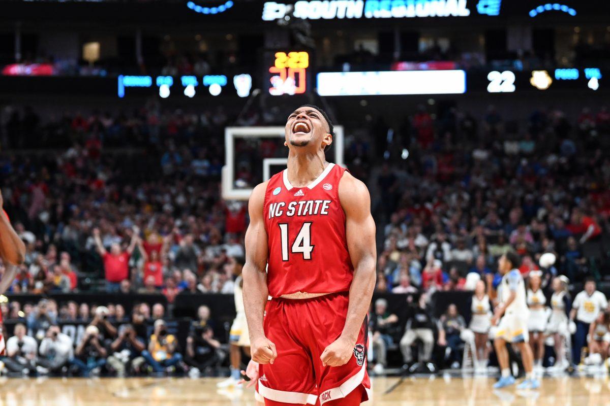 Graduate guard Casey Morsell celebrates after scoring during the Sweet 16 game of the NCAA Tournament against Marquette at American Airlines&#160;Center in Dallas on Friday, March 29, 2024. Morsell scored 15 points, made two rebounds and two steals. NC State beat Marquette 67-58.
