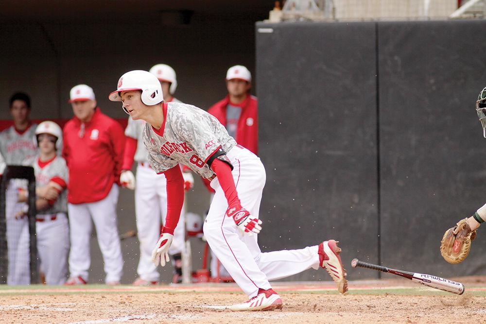 Junior shortstop Trea Turner lets go of the bat after hitting during NC State&#8217;s loss to Miami on March 31, 2014. The 12-5 loss made the Wolfpack's record 15-11 overall and 3-9 in the ACC.