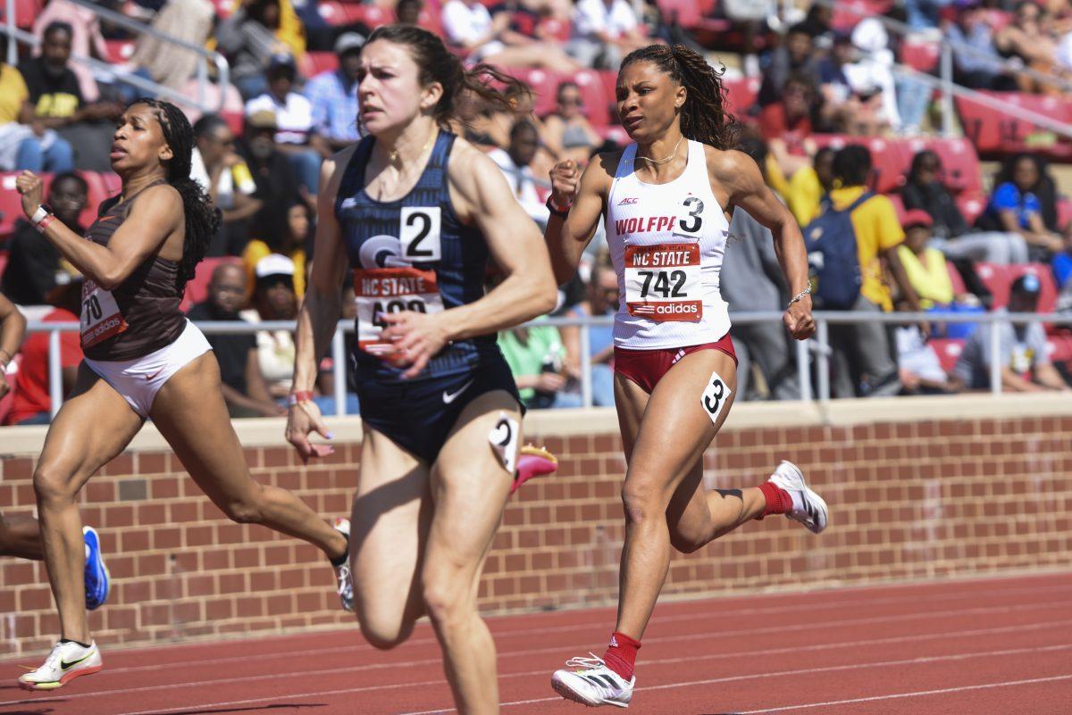 Graduate sprinter Ally Henson rushes to the finish line during the Raleigh Relays track meet at the Derr Track and Field Facility on Saturday, March 30, 2024. Henson finished the women's 200m dash with a time of 25.31.