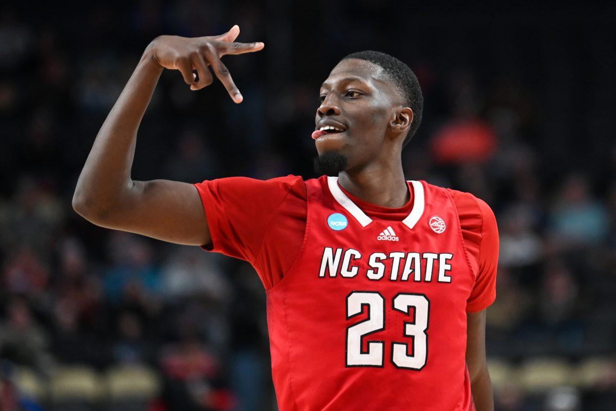 Junior forward Mohamed Diarra celebrates after scoring a three-pointer during the first round game of the NCAA Tournament against Texas Tech at PPG Paints Arena in Pittsburgh on Thursday, March 21, 2024. Diarra scored a career high 17 points and made 12 rebounds. NC State beat Texas Tech 80-67.