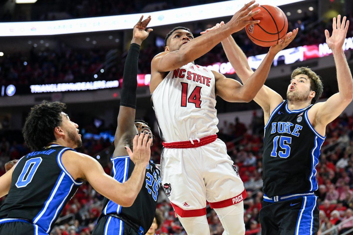 Graduate guard Casey Morsell shoots the ball during the senior night game against Duke in PNC Arena on Monday, March 4, 2024. Morsell scored nine points and made four rebounds. NC State lost to Duke 79-64.