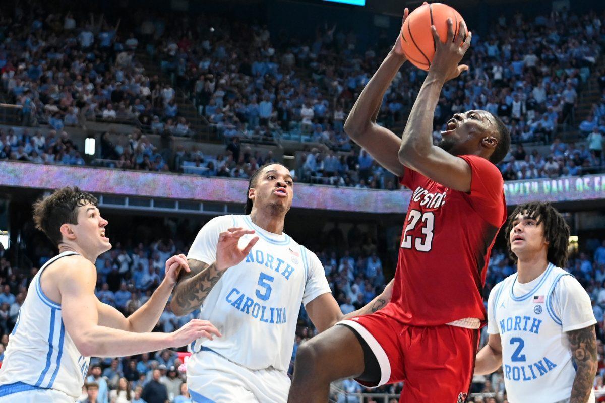 Junior forward Mohamed Diarra shoots the ball during the game against UNC-Chapel Hill in Dean E. Smith Center on Saturday, March 2, 2024. Diarra scored four points and made eight rebounds. NC State lost to Chapel Hill 79-70.