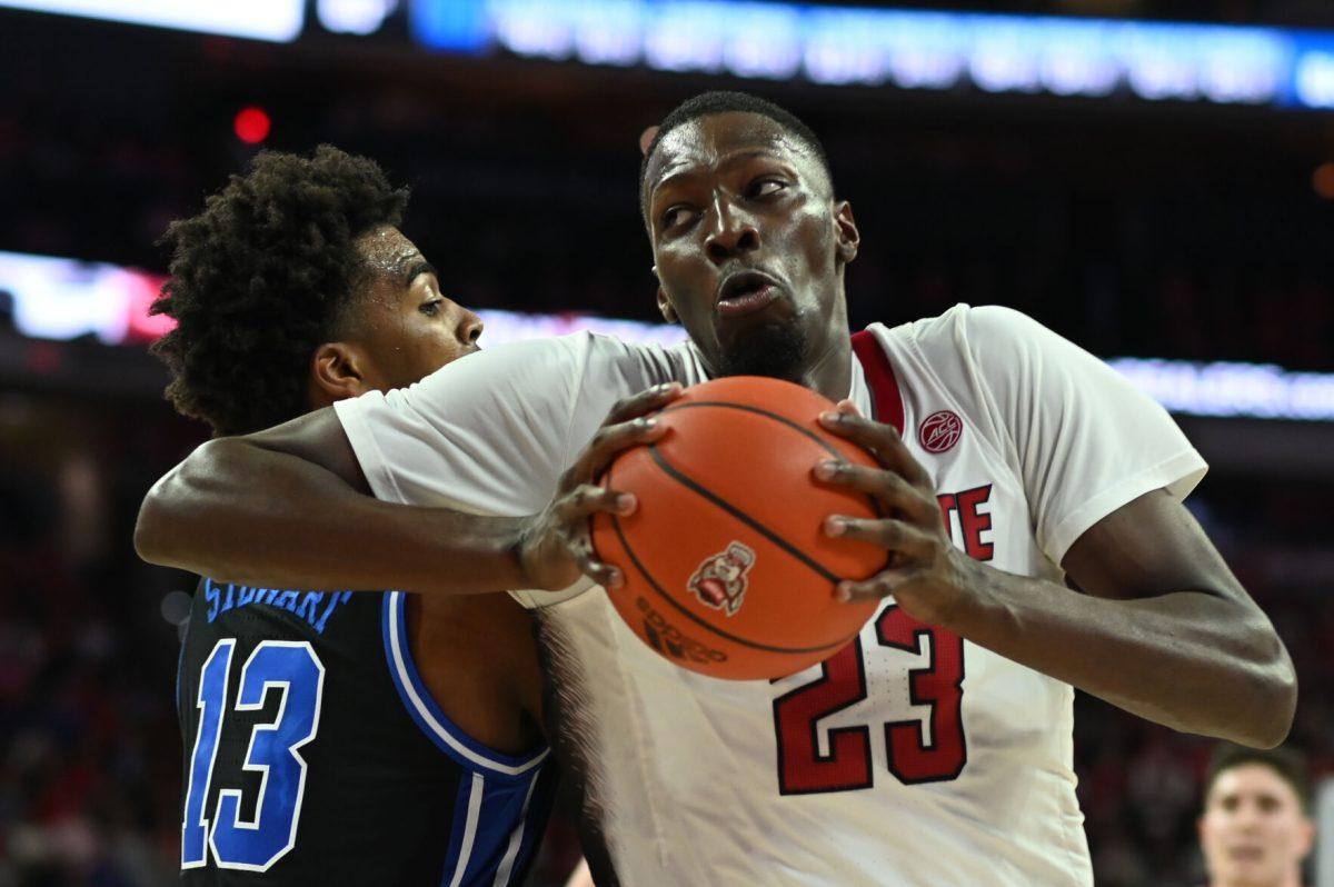 Junior forward Mohamed Diarra pushes past the Duke Blue Devil defense in PNC Arena on Monday, March 4, 2024. Diarra scored 10 points and had seven rebounds against Duke. The Wolfpack lost to the Blue Devils 79-64.