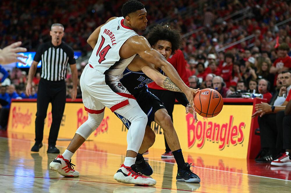 Graduate guard Casey Morsell knocks a pass away from the Duke Blue Devils in PNC Arena on Monday, March 4, 2024. Morsell scored nine points and made four rebounds against Duke. The Wolfpack lost to the Blue Devils 79-64.