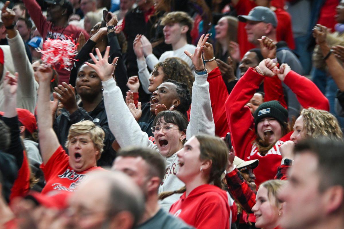 NC State fans cheer after a win during the NCAA March Madness round two game against the Oakland University Golden Grizzlies in PPG Paints Arena on Saturday, March 23, 2024. The Wolfpack beat the Golden Grizzlies 79-73 in overtime.