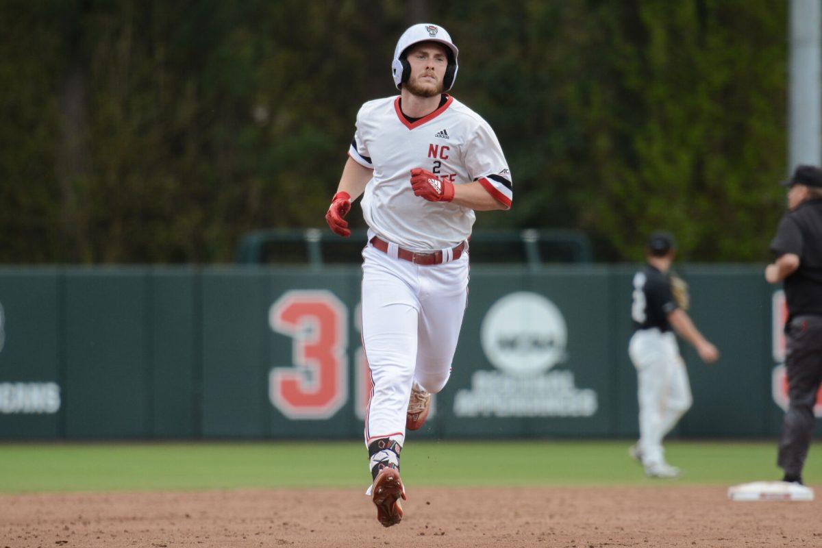 Senior outfielder Noah Soles runs to thrid base during the game against Duke at Doak Field at Dail Park on Saturday, March 23, 2024. Soles scored a home run. NC State defeated Duke 9-8.