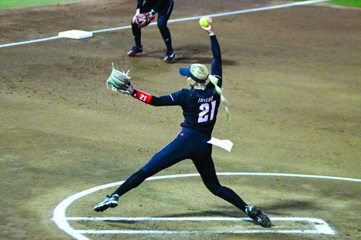 Sophomore pitcher Madison Inscoe pitches during the game against UNC-Charlotte at Dail Softball Stadium on Tuesday, March 26, 2024. Inscoe pitched three innings and gave up two runs while recording two strikeouts. The Wolfpack lost to the 49ers 4-2.