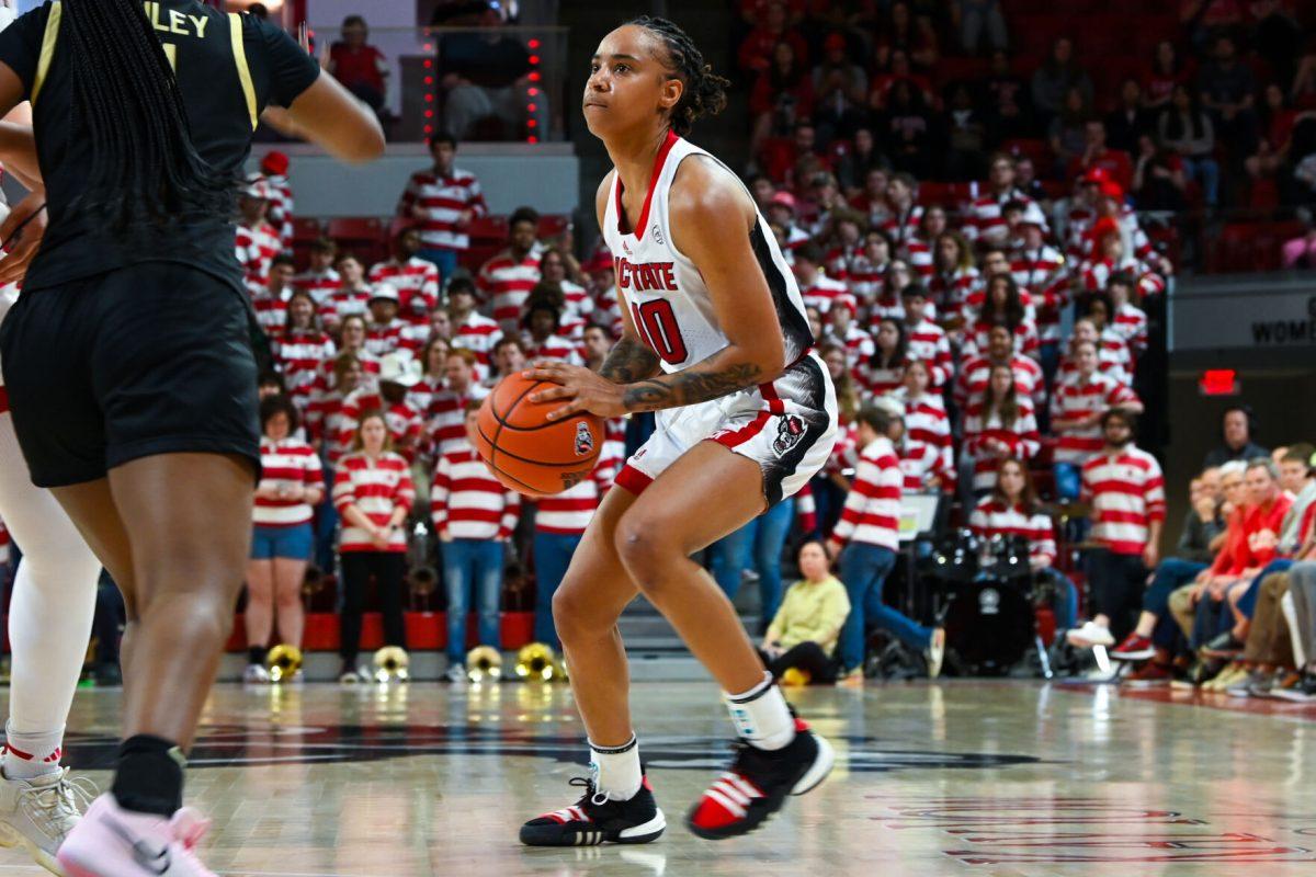 Junior guard Aziaha James prepares to shoot during the game against Wake Forest in Reynolds Coliseum on Sunday, March 3, 2024. NC State won against Wake Forest 75-57.