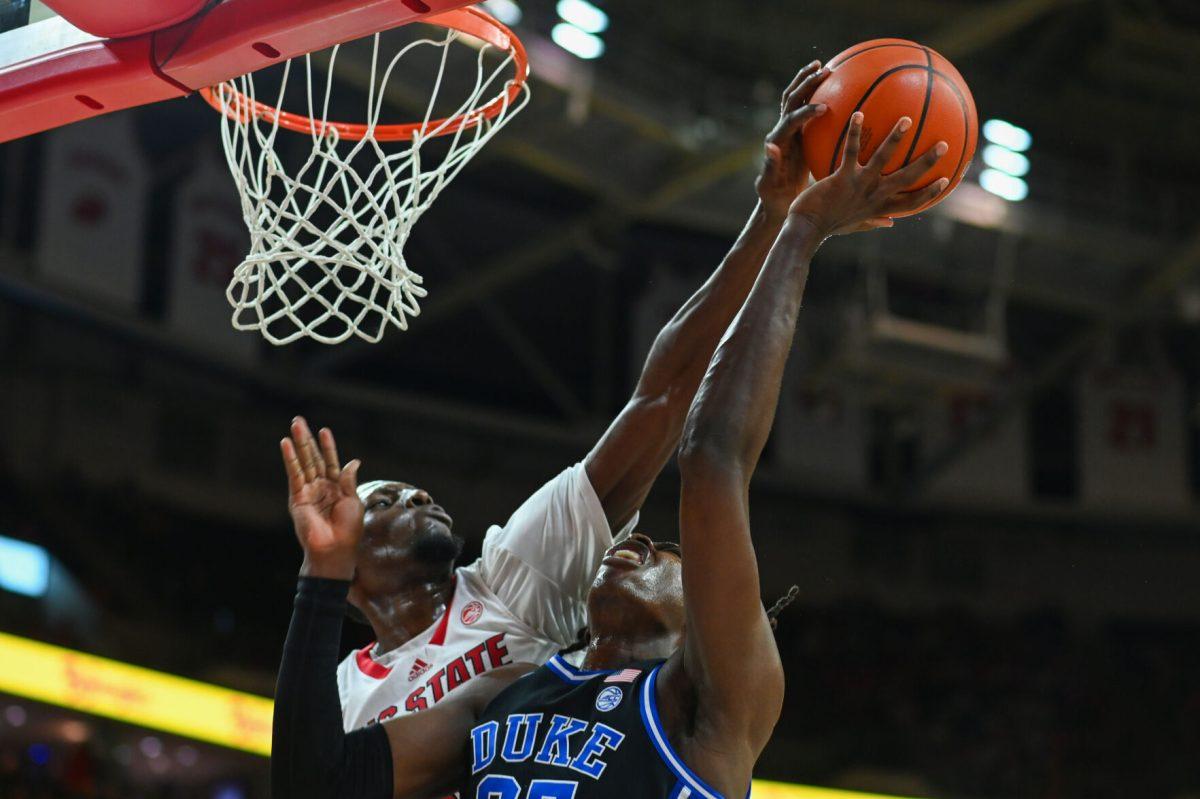 Junior forward Mohamed Diarra blocks a Duke Blue Devil layup in PNC Arena on Monday, March 4, 2024. Diarra scored 10 points and had seven rebounds against Duke. The Wolfpack lost to the Blue Devils 79-64.