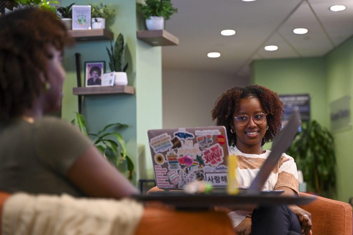 Alanah Kerr, a third-year studying biological sciences, listens to Diarra Diagne, a third-year studying political science, while in the Women's Center on Tuesday, March 5, 2024. The Women's Center is one of the four campus community centers open to NC State students.