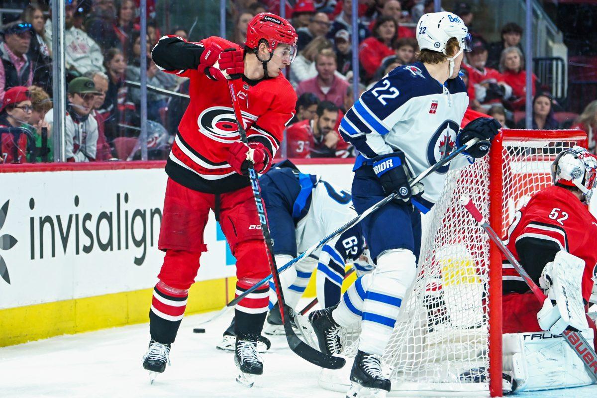 Defenseman Brady Skjei guards an opponent during the Carolina Hurricanes game versus the Winnipeg Jets at PNC Arena on Saturday, March 2, 2024. The Hurricanes lost 5-3 to the Jets.