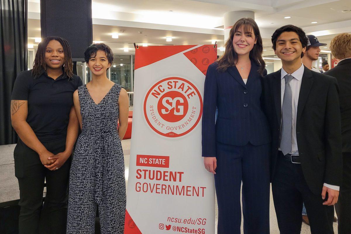 From left to right,&#160;Lanadia Adams, a third-year studying political science and criminology, Caroline Miranda, a second-year studying physics, Allison Markert, a third-year studying natural resources and Isaac Carreno, a fourth-year studying social work stand during the Student Government 2024 Spring Election Reveal Party&#160;in Talley Student Union on Wednesday, March 6, 2024.