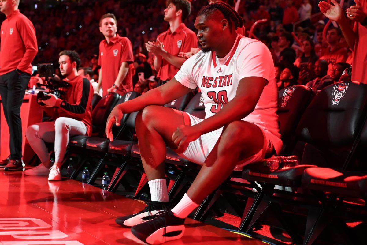 Graduate forward DJ Burns waits for his name to be called before the game versus the Duke Blue Devils in PNC Arena on Monday, March 4, 2024. Burns led the Wolfpack with 27 points against Duke. The Wolfpack lost to the Blue Devils 79-64.