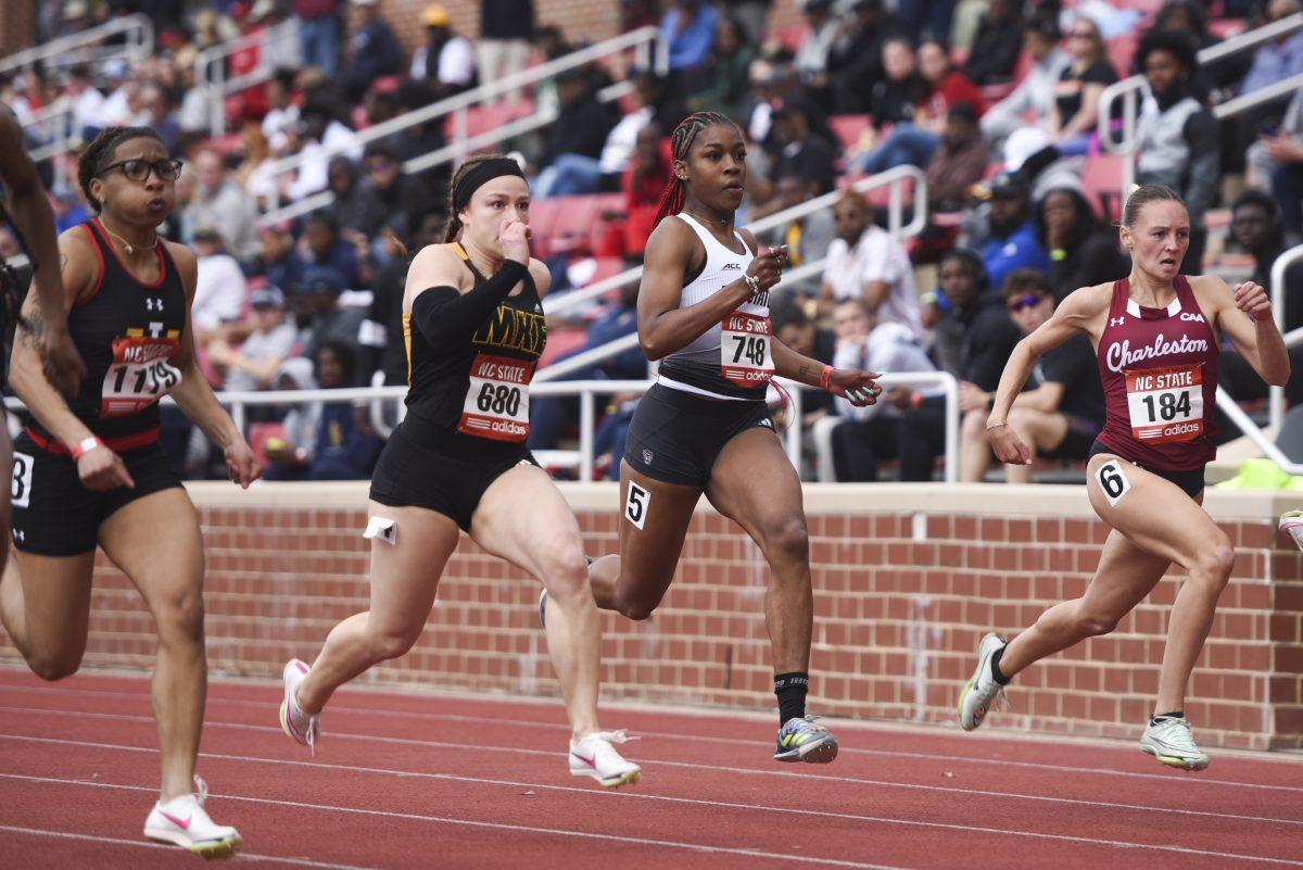 Freshman sprinter Jordyn Parker reaches the finish line during the Raleigh Relays track meet at the Derr Track and Field Facility on Friday, March 29, 2024. Parker finished with a time of 12.04 in the 100m dash.