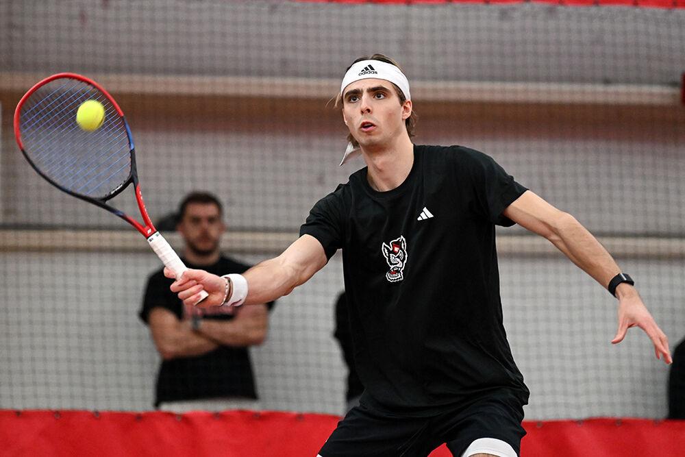 Senior Robin Catry forehands the ball during the match against Columbia at J.W. Isenhour Tennis Center on Sunday, Feb. 4, 2024. Catry won his singles match 6-4, 6-4. NC State lost to Columbia 4-3.