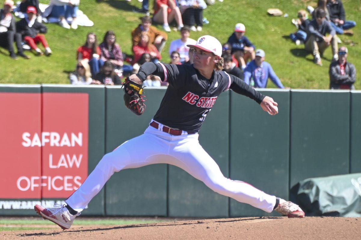 Sophomore pitcher Dominic Fritton pitches the ball during the game against Duke at Doak Field at Dail Park on Friday, March 8, 2024. The Wolfpack lost to the Blue Devils 13-2. NC State won the series.