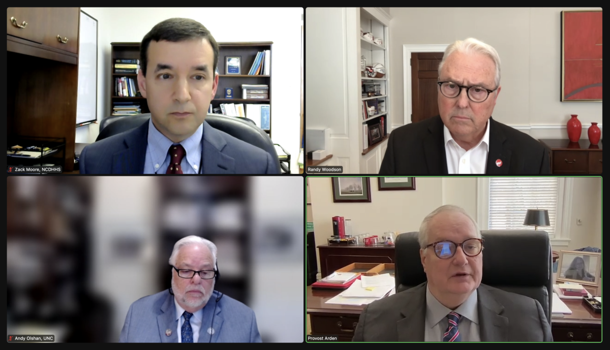 State epidemiologist Dr. Zach Moore,&#160;Chancellor Randy Woodson,&#160;UNC-Chapel Hill professor in cancer epidemiology&#160;Andrew Olshan&#160;and&#160;Provost Warwick Arden participate in a webinar Monday, March 25, 2024. Woodson and Arden provided information on NC State's investigation of PCBs in Poe Hall, and Moore and Olshan discussed the challenges of investigating&#160;cancer clusters.&#160;