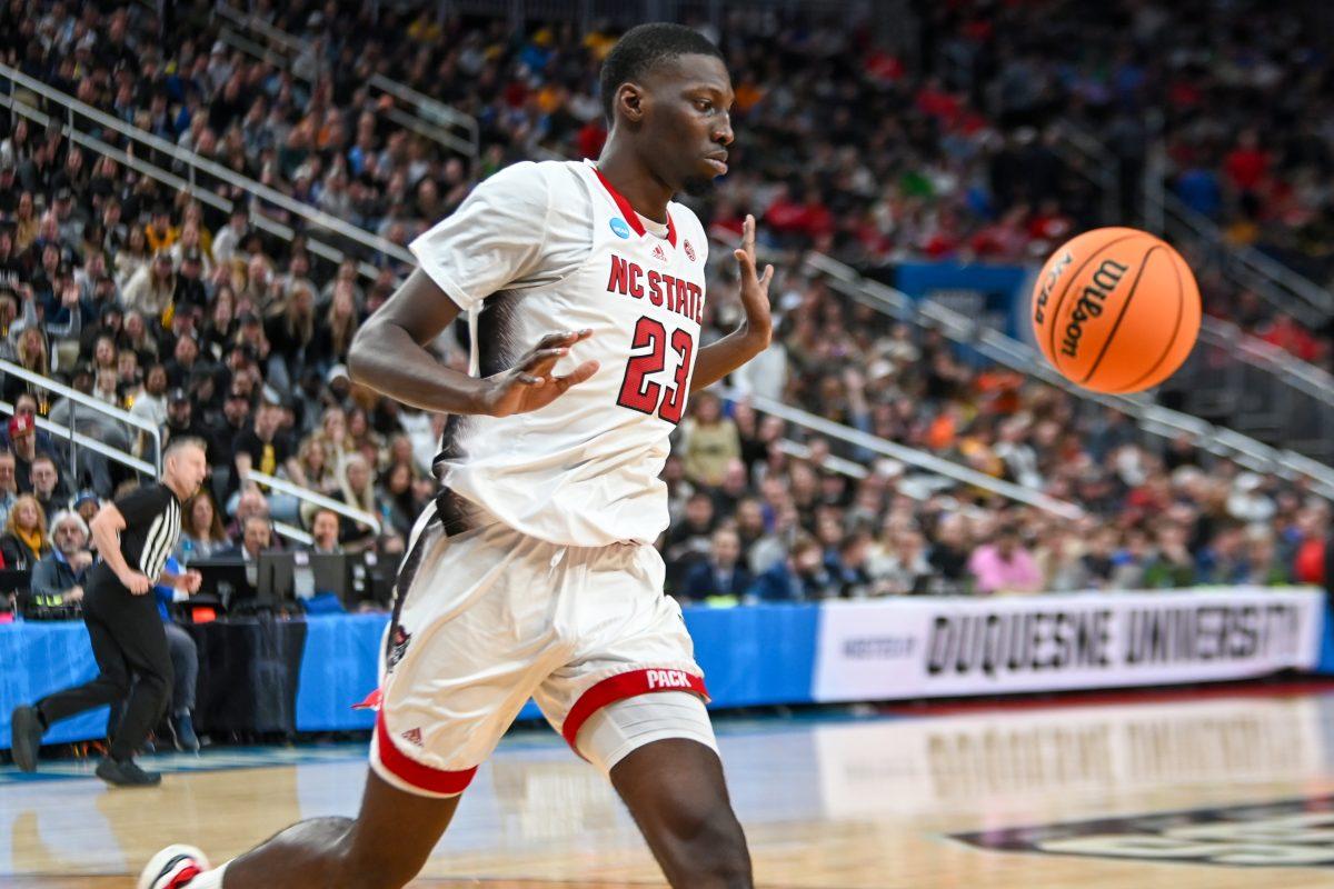 Junior forward Mohamed Diarra allows the ball to bounce out of bounds during the NCAA March Madness round two game against the Oakland University Golden Grizzlies in PPG Paints Arena on Saturday, March 23, 2024. Diarra had 11 points. The Wolfpack beat the Golden Grizzlies 79-73 in overtime.